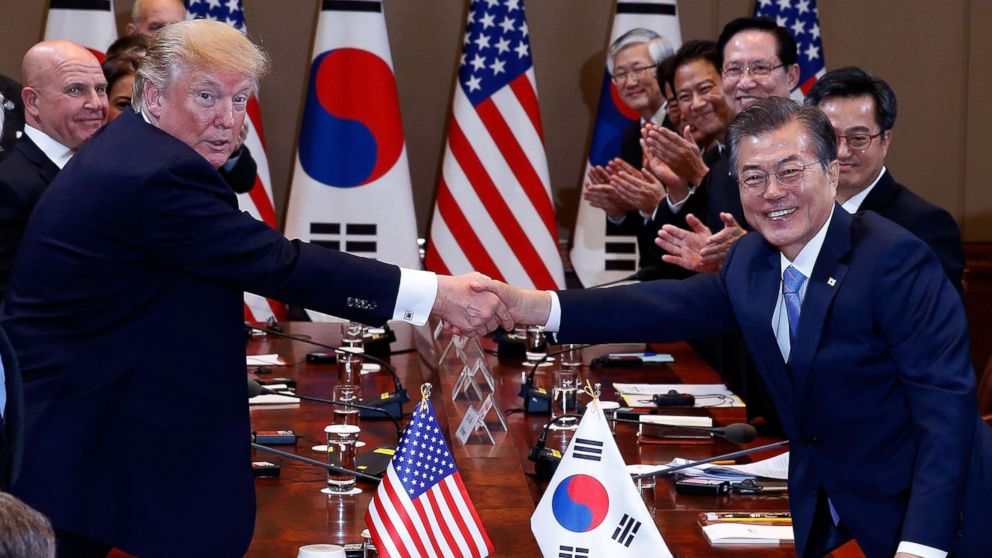 South Korean President Moon Jae-In shakes hands with President Donald Trump during their summit at the presidential Blue House, Nov. 7, 2017 in Seoul, South Korea.