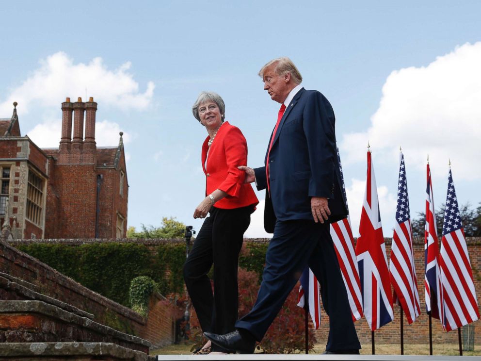 PHOTO: President Donald Trump walks with British Prime Minister Theresa May at the conclusion of their joint news conference at Chequers, in Buckinghamshire, England, July 13, 2018.