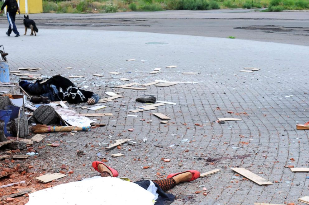 PHOTO: A couple was just killed while going to work by artillery fire in the city of Donetsk.