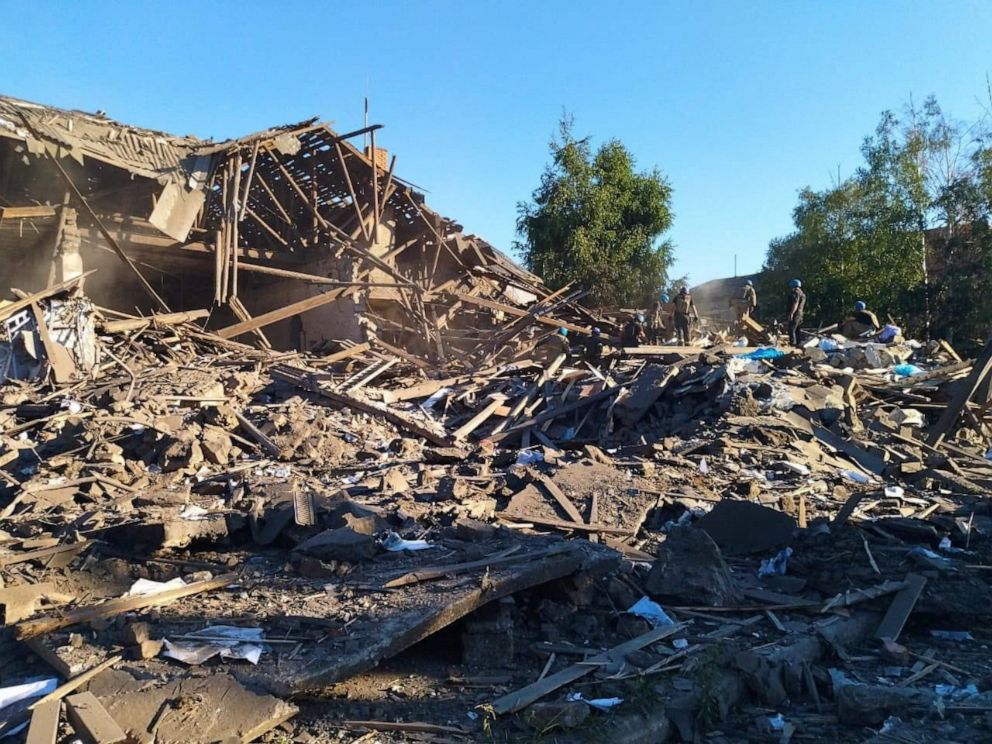 PHOTO: Rescuers work at the ruins of a residential building destroyed by a Russian military strike, as Russia's attack on Ukraine continues, in the town of Toretsk, Donetsk region, Ukraine, on July 18, 2022.