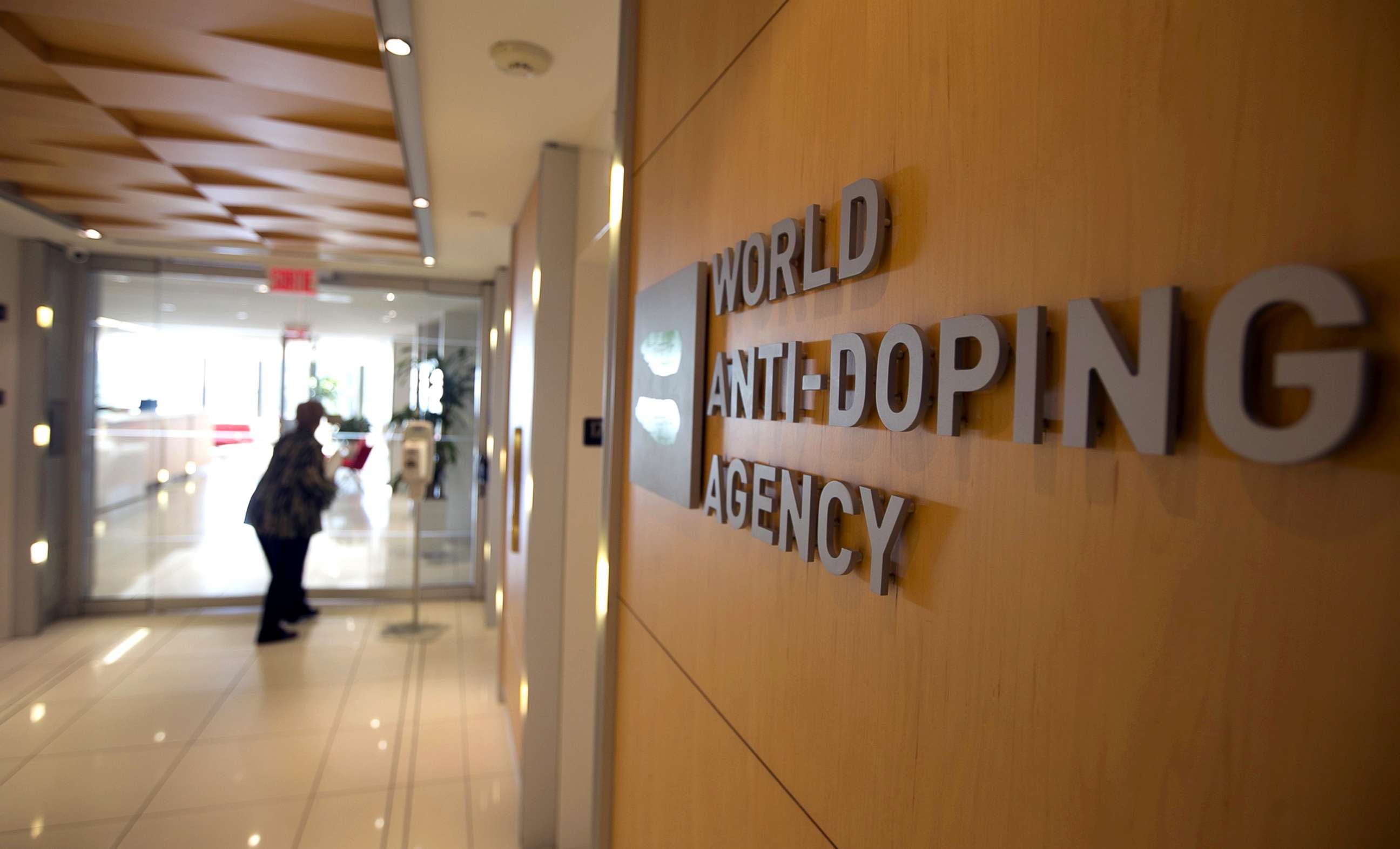 PHOTO: A woman walks into the head office of the World Anti-Doping Agency (WADA) in Montreal, Quebec, Canada, Nov. 9, 2015. 