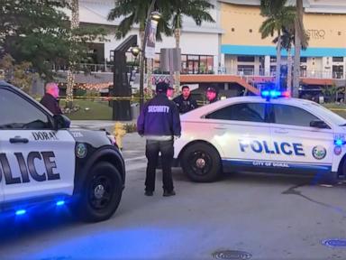 Security guard killed, officer and 6 others injured in Florida shooting