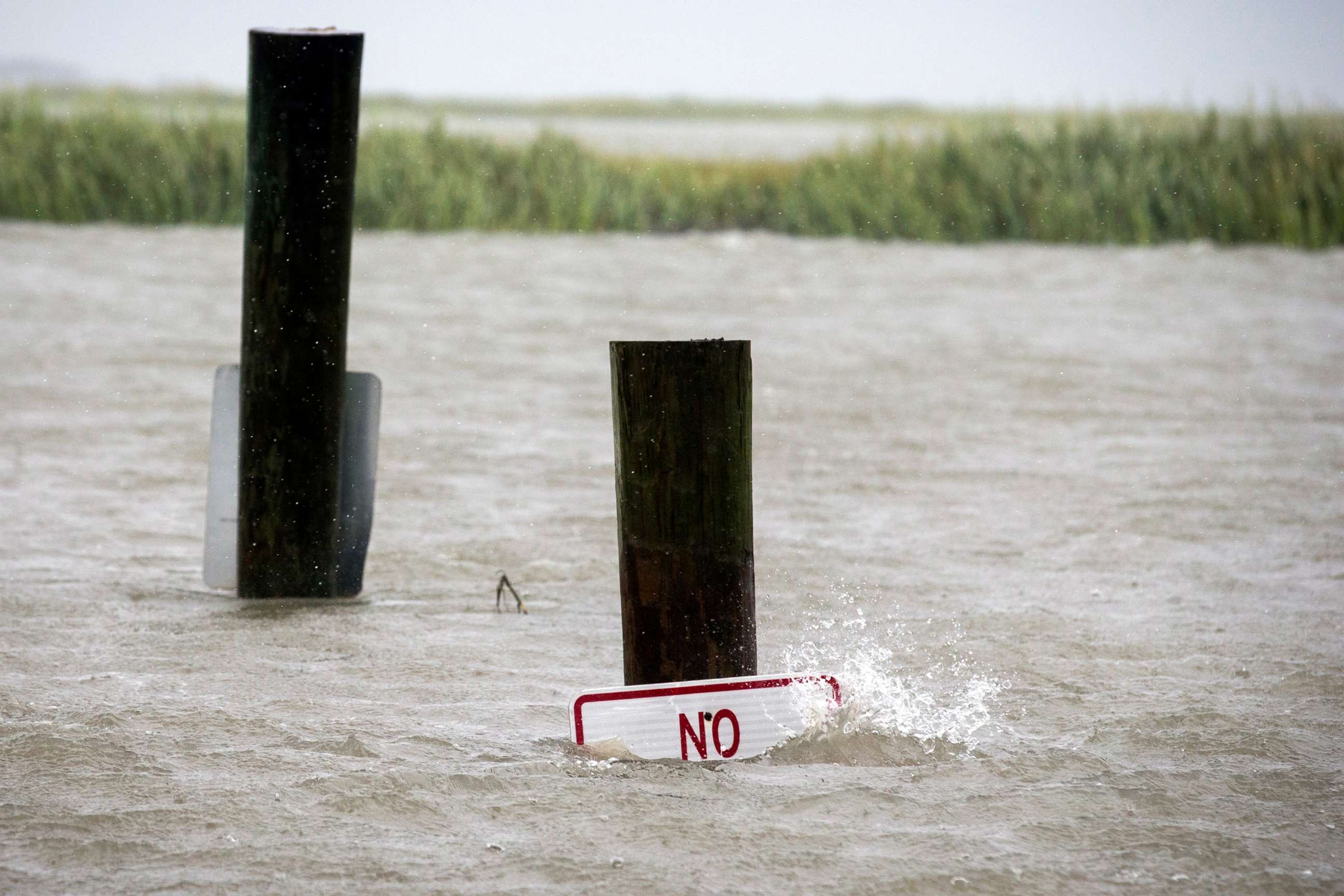 PHOTO: A sign at the Lazaretto Creek boat ramp as is nearly underwater at high tide as Hurricane Dorian makes its way up the east coast, Sept. 4, 2019, toward Tybee Island, Ga