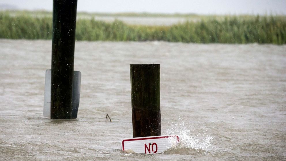 PHOTO: A sign at the Lazaretto Creek boat ramp as is nearly underwater at high tide as Hurricane Dorian makes its way up the east coast, Sept. 4, 2019, toward Tybee Island, Ga