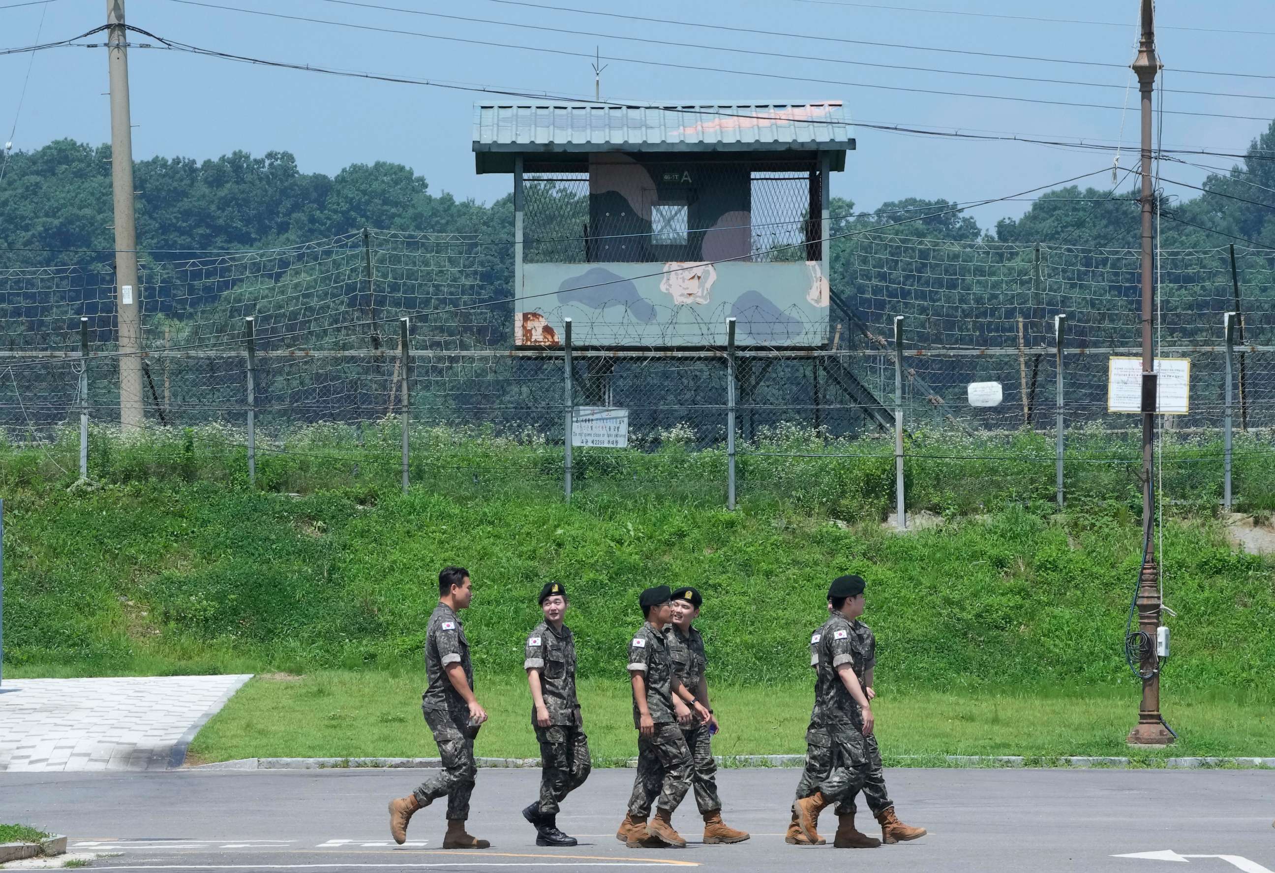 PHOTO: South Korean army soldiers pass by a military guard post at the Imjingak Pavilion in Paju, South Korea, near the border with North Korea, Wednesday, July 19, 2023.