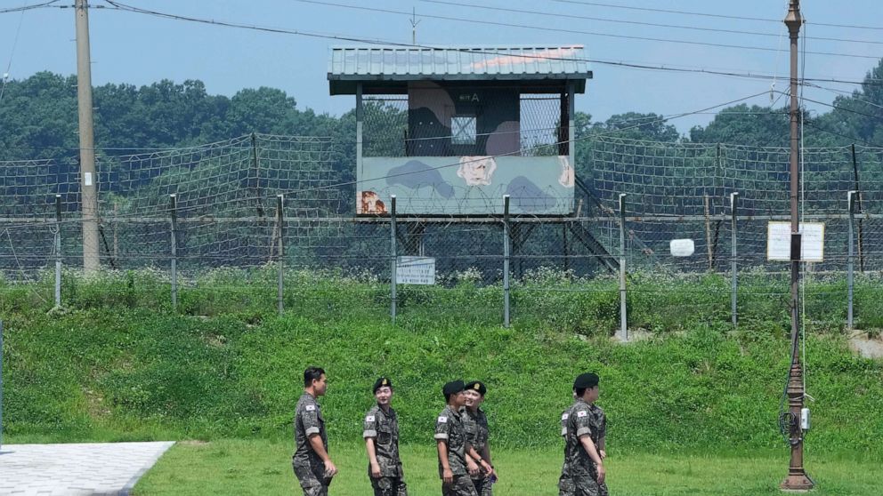 PHOTO: South Korean army soldiers pass by a military guard post at the Imjingak Pavilion in Paju, South Korea, near the border with North Korea, Wednesday, July 19, 2023.