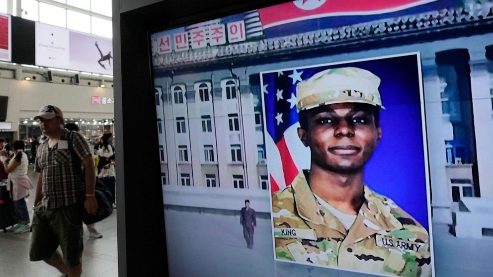 PHOTO: A TV screen shows a file image of American soldier Travis King during a news program at the Seoul Railway Station in Seoul, South Korea, Aug. 16, 2023.