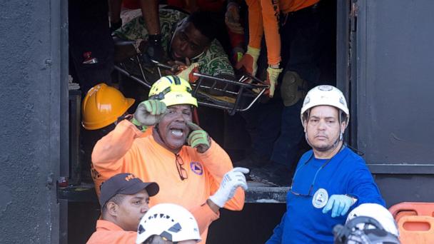 jet set club collapse green dress Women flee as ceiling starts to buckle in Dominican Republic nightclub  collapse