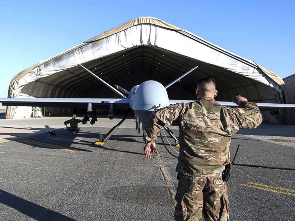 PHOTO: irman 1st Class Johnathan, 386th Expeditionary Aircraft Maintenance Squadron crew chief, and Airman 1st Class Brandon, 386th EAMXS avionics specialist, conduct flight control checks of a MQ-9 Reaper launch in Southwest Asia, Feb. 21, 2019.