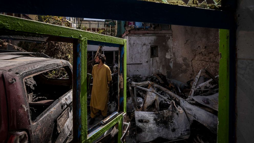 PHOTO: An Afghan inspects the damage of Ahmadi family house in Kabul, Afghanistan, Monday, Sept. 13, 2021.