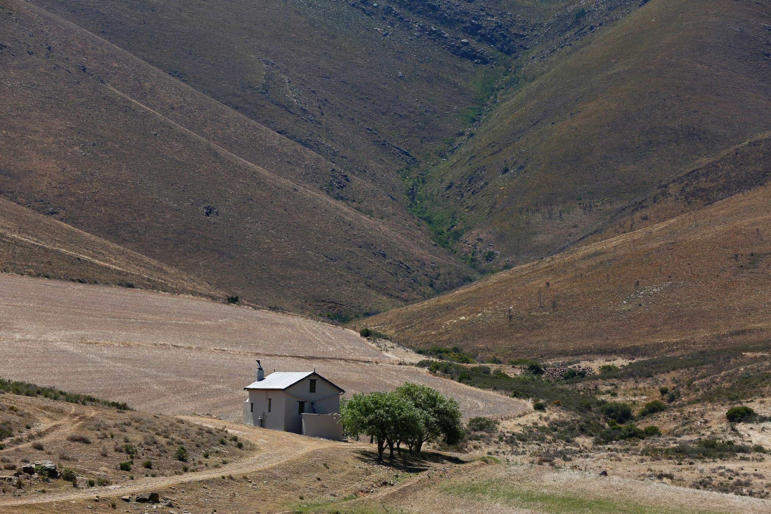 PHOTO: A general view of a farm house amidst dried fields on a farm in the Overberg, South Africa, Jan. 5, 2018.