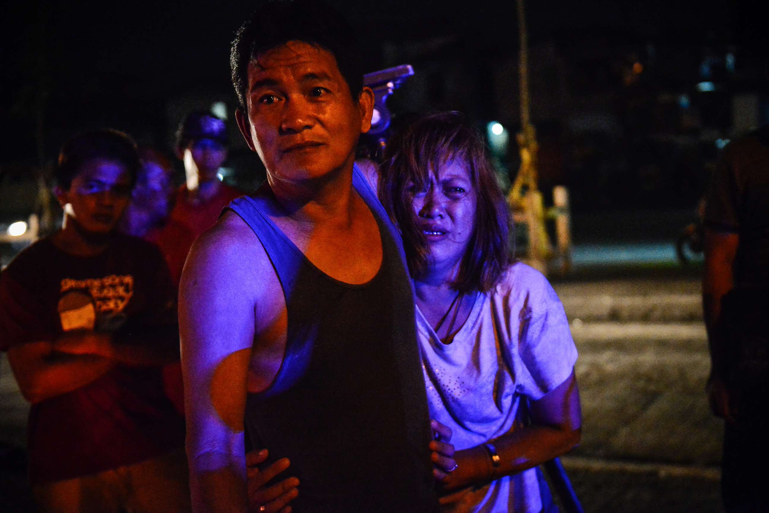 PHOTO: The parents of Irish Glorioso weep after learning their son was shot dead by unknown assailants in Navotas, north of Manila, Philippines, June 8, 2017. Drug-related killings continue as President Rodrigo Duterte marks his first year in power. 