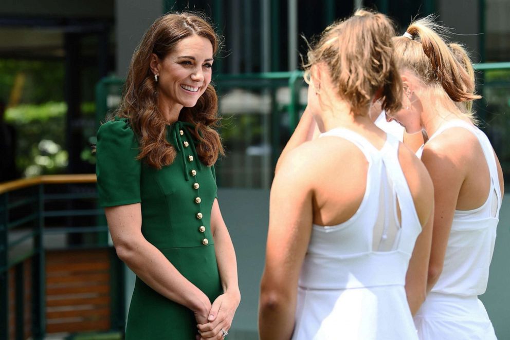 PHOTO: Catherine, Duchess of Cambridge meets junior players ahead of the Women's Final on day twelve of the 2019 Wimbledon Championships  in Wimbledon, southwest London, July 13, 2019. 