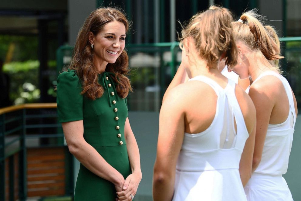 PHOTO: Catherine, Duchess of Cambridge meets junior players ahead of the Women's Final on day twelve of the 2019 Wimbledon Championships in Wimbledon, southwest London, July 13, 2019. 