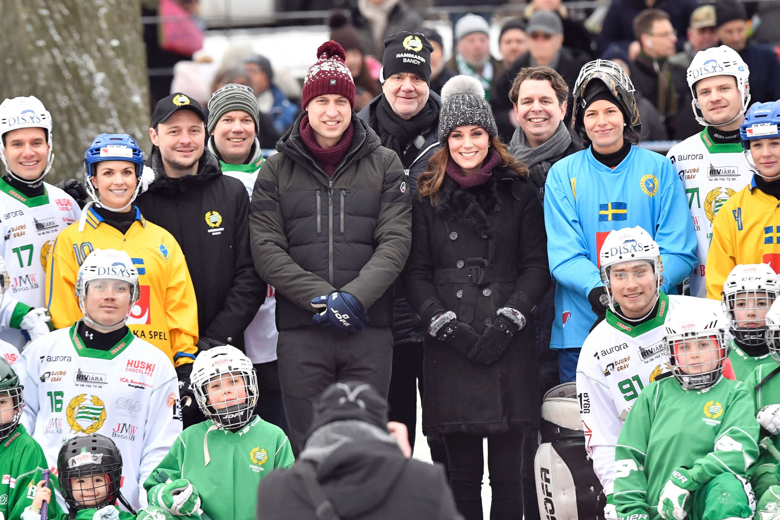 PHOTO: Britain's Prince William and Kate, Duchess of Cambridge pose with young members of the Hammarby bandy sports club in Stockholm, Jan. 30, 2018, during their 4-day visit to Sweden and Norway. 