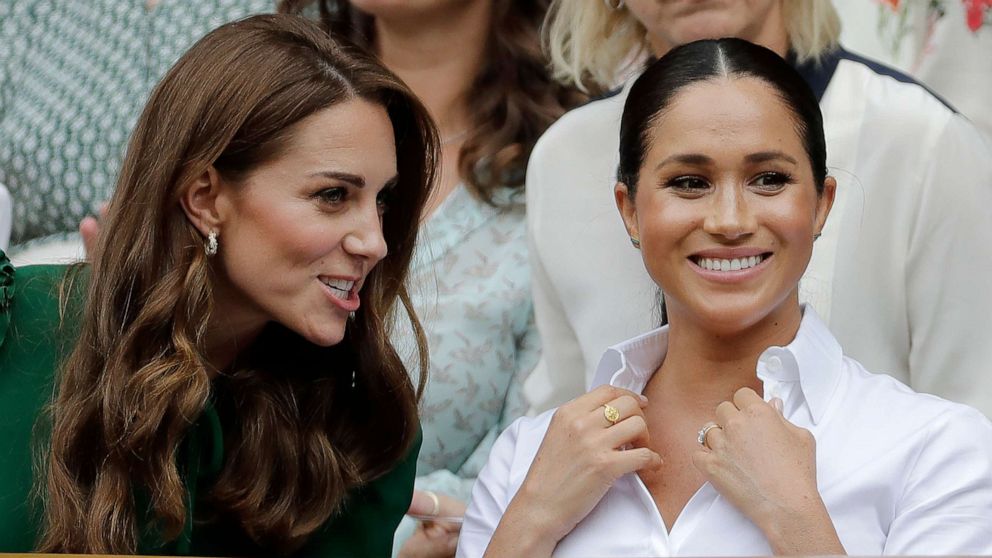 PHOTO: Kate, Duchess of Cambridge and Meghan, Duchess of Sussex chat watch the women's singles final match between Serena Williams of the U.S. and Romania's Simona Halep on day twelve of the Wimbledon Tennis Championships in London, July 13, 2019.