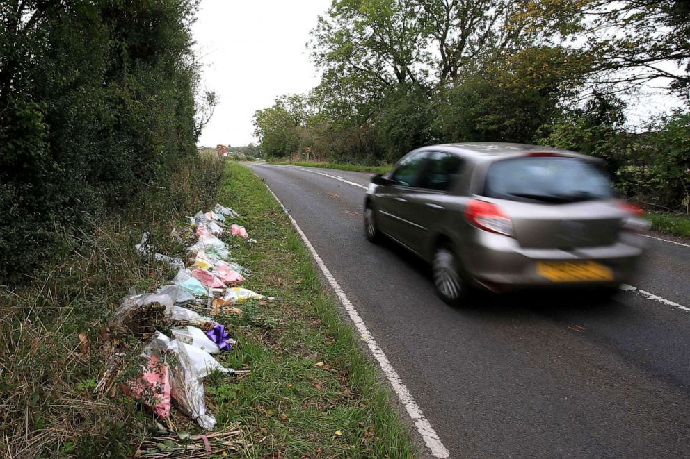 PHOTO: Floral tributes lay on the roadside near RAF Croughton in Northamptonshire, central England,  Oct. 10, 2019, at the spot where British motorcyclist Harry Dunn was killed as he traveled along the B4031 on Aug. 27, 2019.