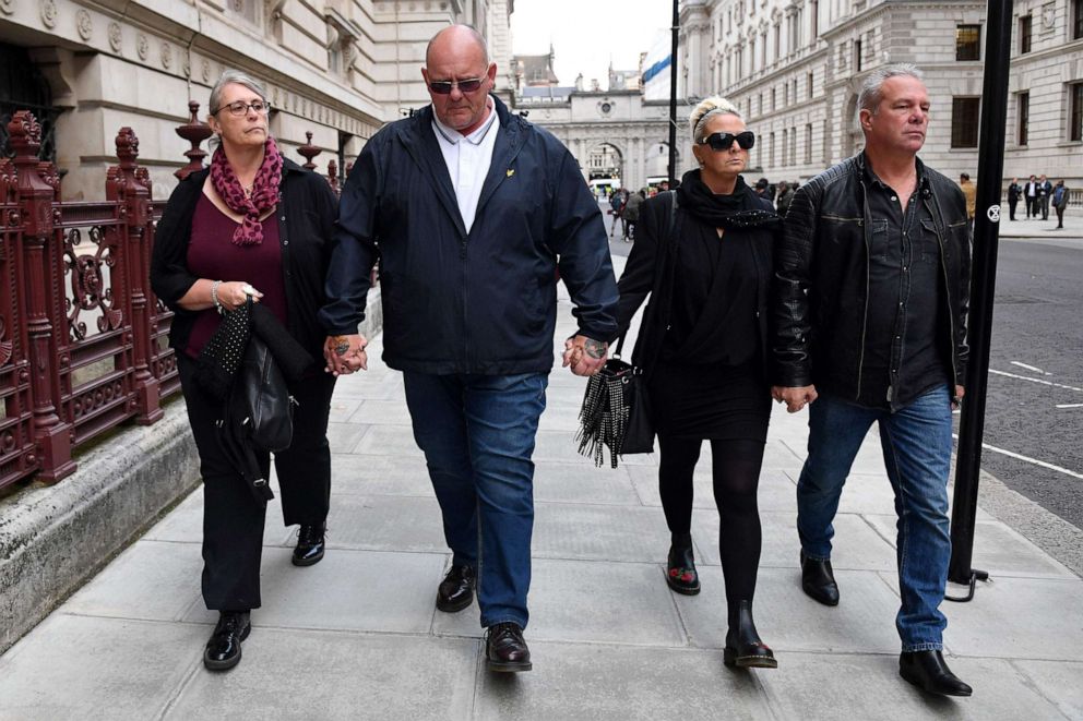 PHOTO: Charlotte Charles (2R) and Tim Dunn, (2L), parents of teenage motorcyclist Harry Dunn who was killed in a collision with a car, leave after a meeting with Britain's Foreign Secretary and First Secretary of State in London, Oct. 9, 2019. 