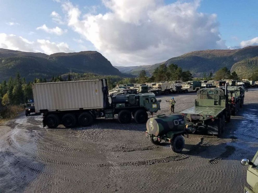 PHOTO: U.S. Marines with II Marine Expeditionary Force, standby to off-load equipment for NATO exercise Trident Juncture from ARC Resolve in Hammernesodden, Norway, Sept. 23, 2018. 