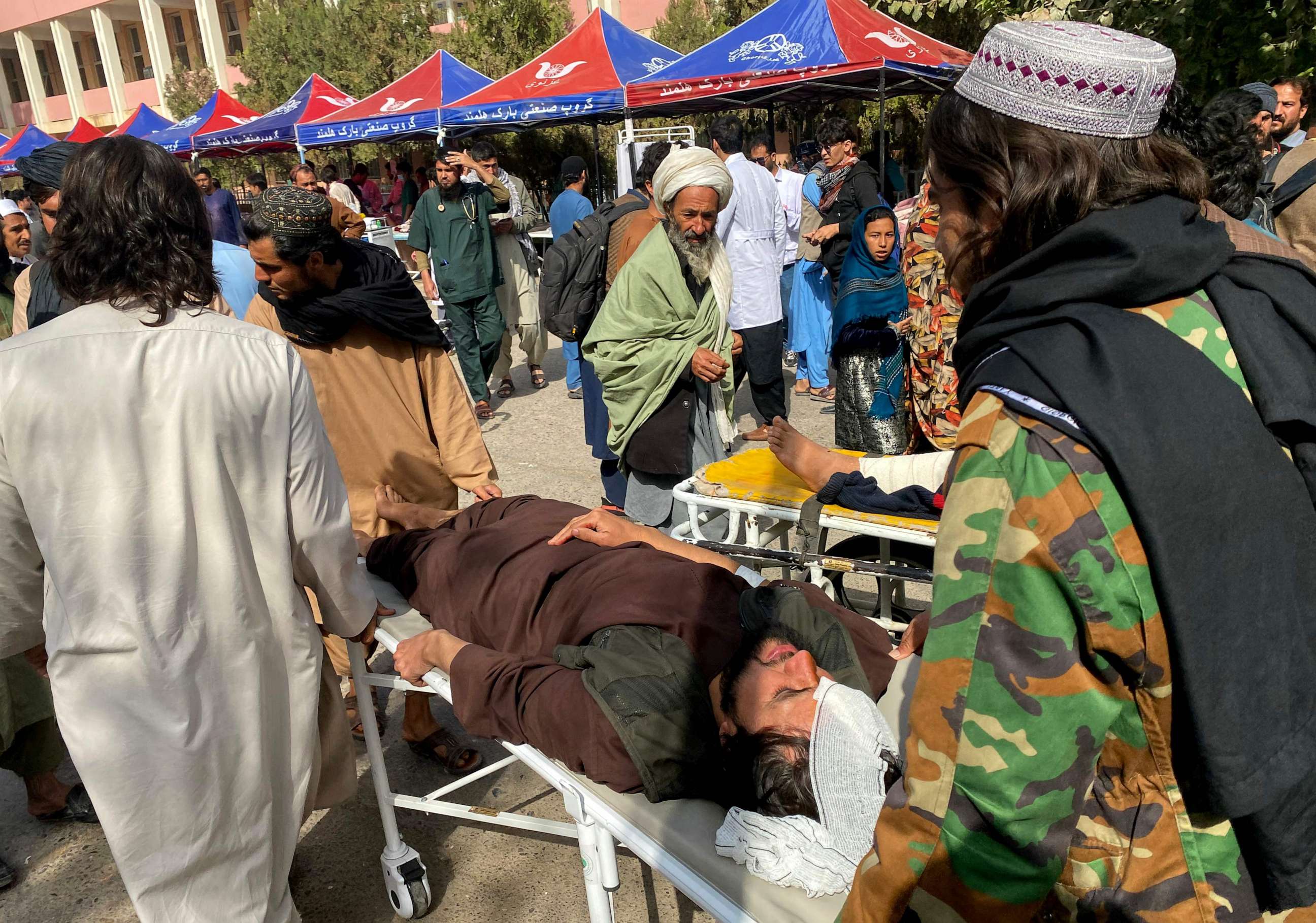 PHOTO: Injured Afghan people being brought to a hospital following earthquake in Herat on October 15, 2023. A magnitude 6.3 earthquake shook western Afghanistan on October 15, the US Geological Survey said. (Photo by AFP) (Photo by -/AFP via Getty Images)