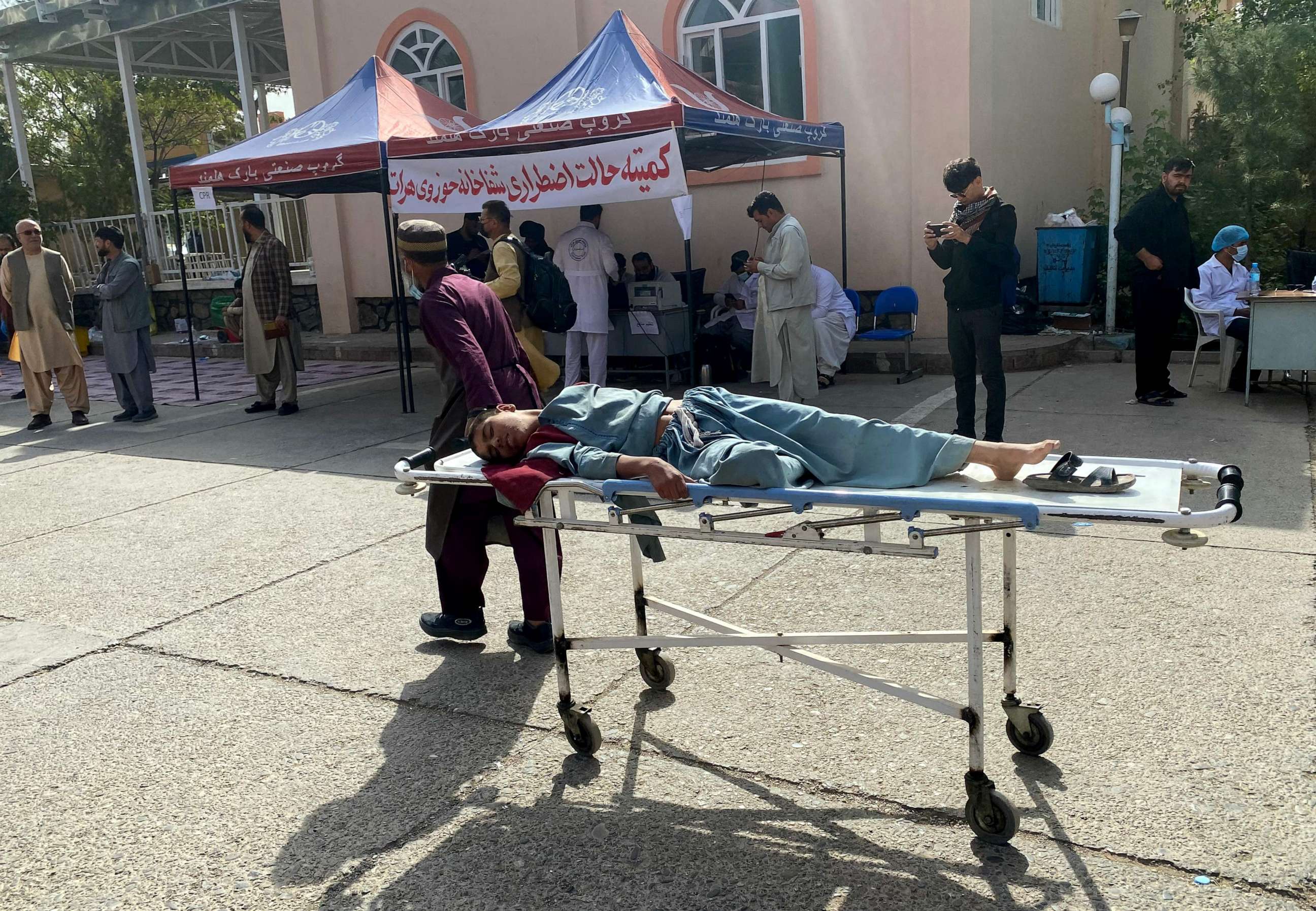 PHOTO: An injured Afghan man being brought to a hospital following earthquake in Herat on October 15, 2023. A magnitude 6.3 earthquake shoopeople were killed in tremors last week. (Photo by AFP) (Photo by -/AFP via Getty Images)