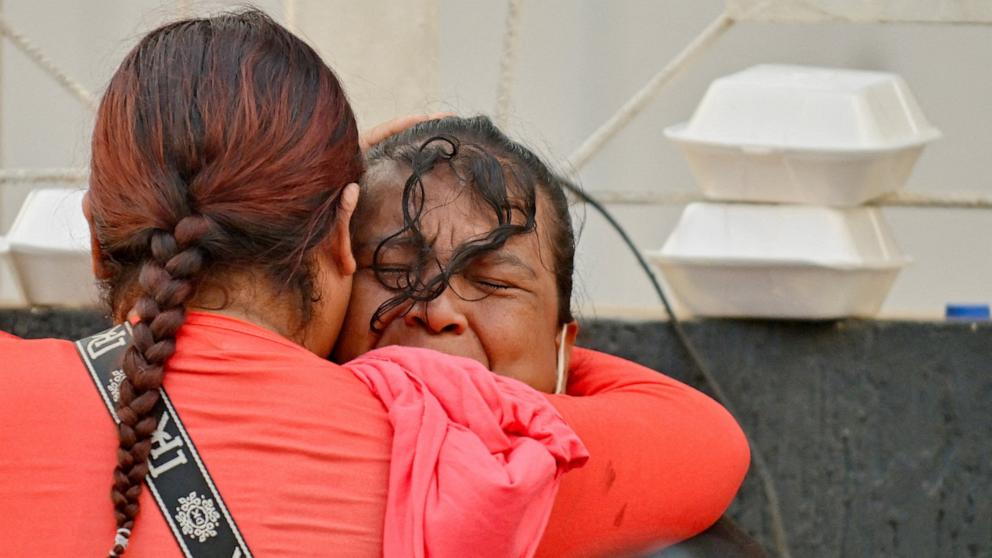 PHOTO: People embrace, as rescue operations continue after earthquakes hit the country in La Guaira, Venezuela, June 27, 2026. 