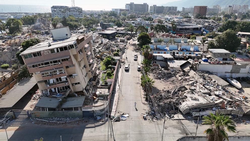 PHOTO: This aerial view shows a heavily damaged coastal area with collapsed buildings and debris following the June 24 twin earthquakes in Caraballeda, La Guaira State, Venezuela, June 29, 2026. 