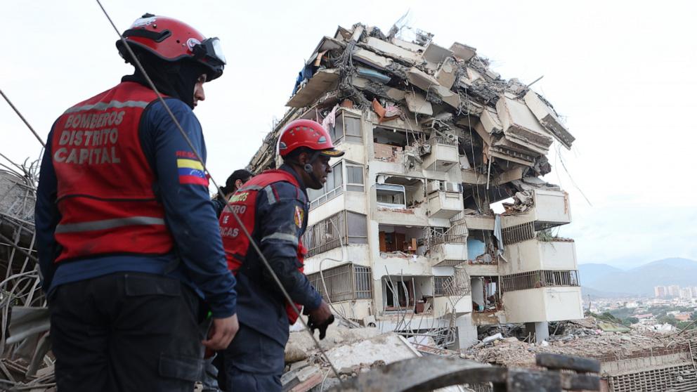 PHOTO: Rescue workers search through the rubble after an earthquake in La Guaira, Venezuela, June 25, 2026. 