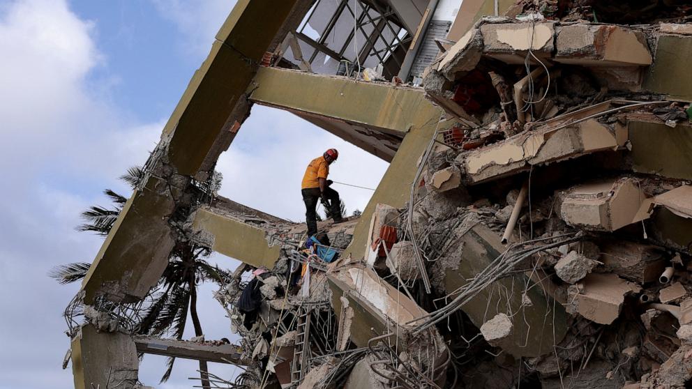 PHOTO: A rescuer works at the site of a collapsed building in the aftermath of earthquakes in La Guaira, Venezuela, June 29, 2026. 