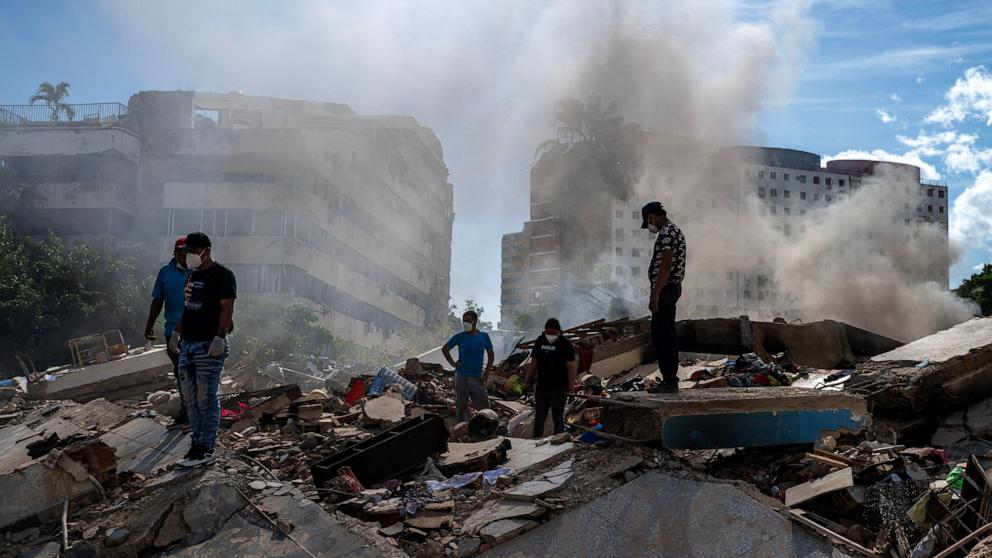 PHOTO: Rescuers and volunteers search for survivors in La Guaira, La Guaira state, Venezuela, June 28, 2026, following twin earthquakes. 