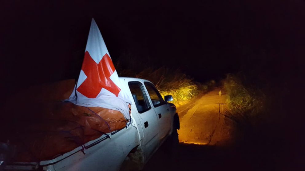 A handout photo from The International Federation of Red Cross and Red Crescent (IFRC) shows health workers on their way to Bikoro, the epicenter of the latest Ebola outbreak, in The Democratic Republic Of The Congo, on May 17, 2018. 