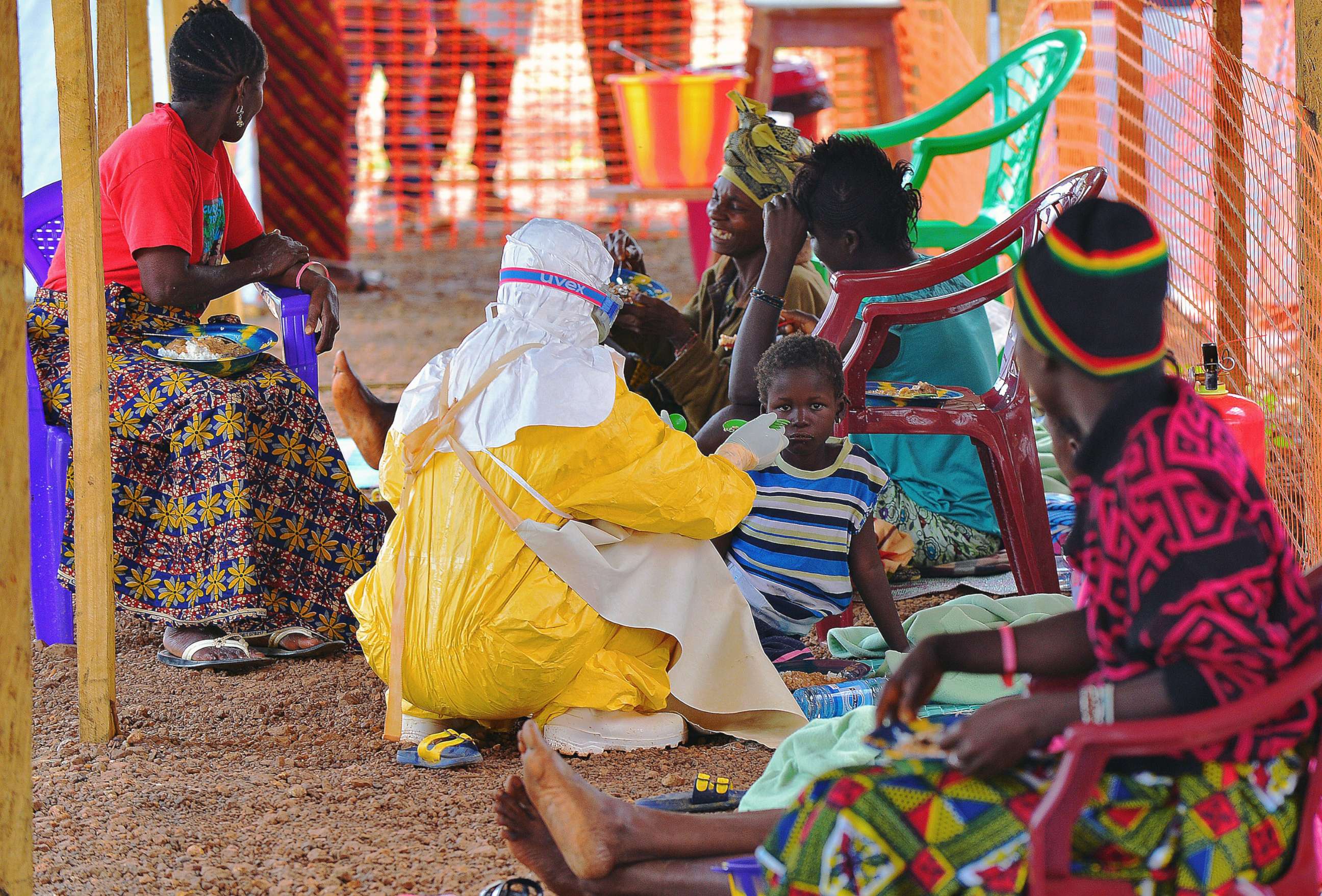 PHOTO: An MSF medical worker feeds an Ebola child victim at an MSF facility in Kailahun, on Aug. 15, 2014.