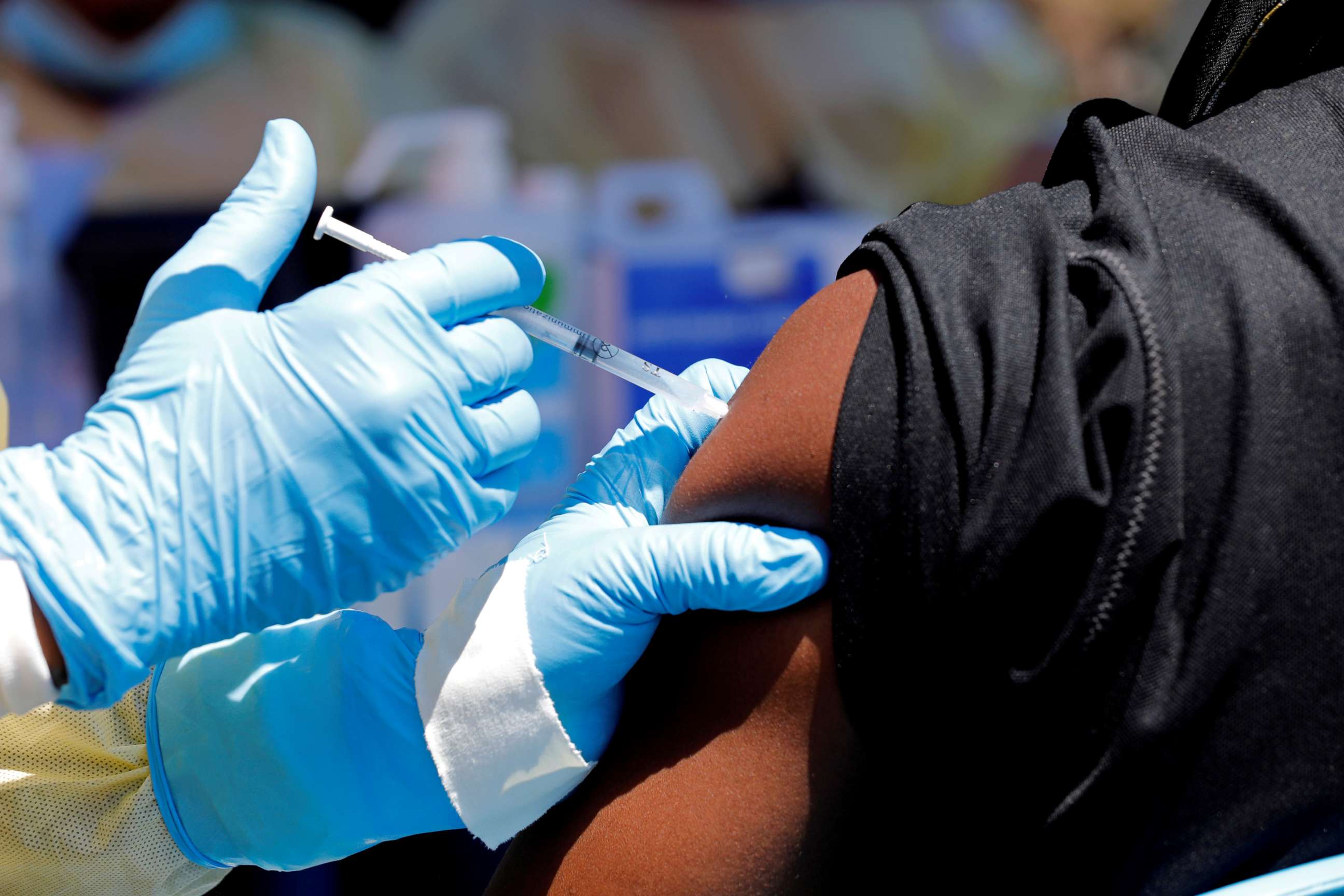 FILE PHOTO: A health worker injects a man with an Ebola vaccine in Goma, Democratic Republic of Congo, Aug. 5, 2019.