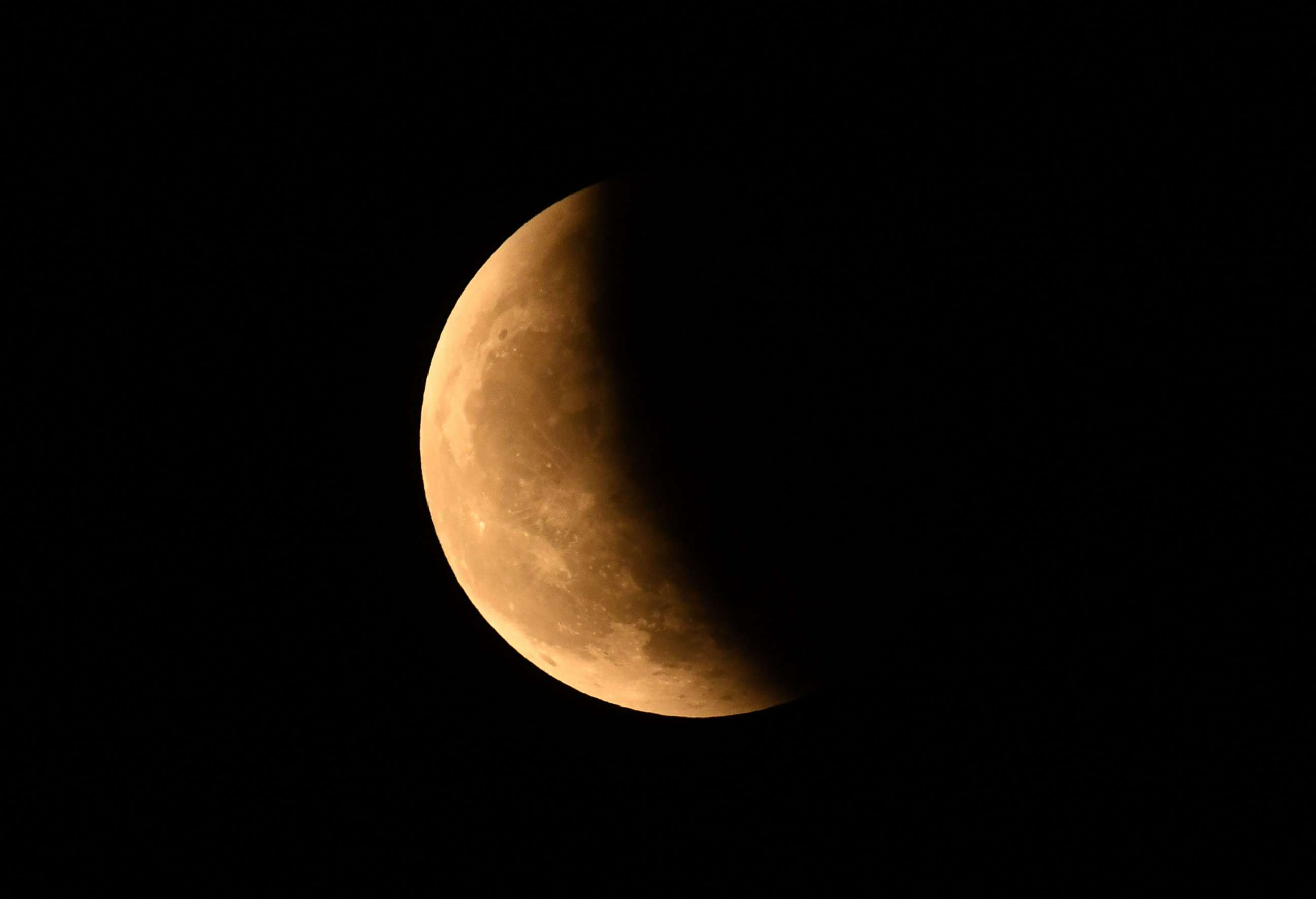 PHOTO: The "Blood Moon" is seen during a total lunar eclipse in Guwahatii on Nov. 8, 2022.
