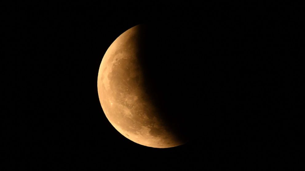 PHOTO: The "Blood Moon" is seen during a total lunar eclipse in Guwahatii on Nov. 8, 2022.