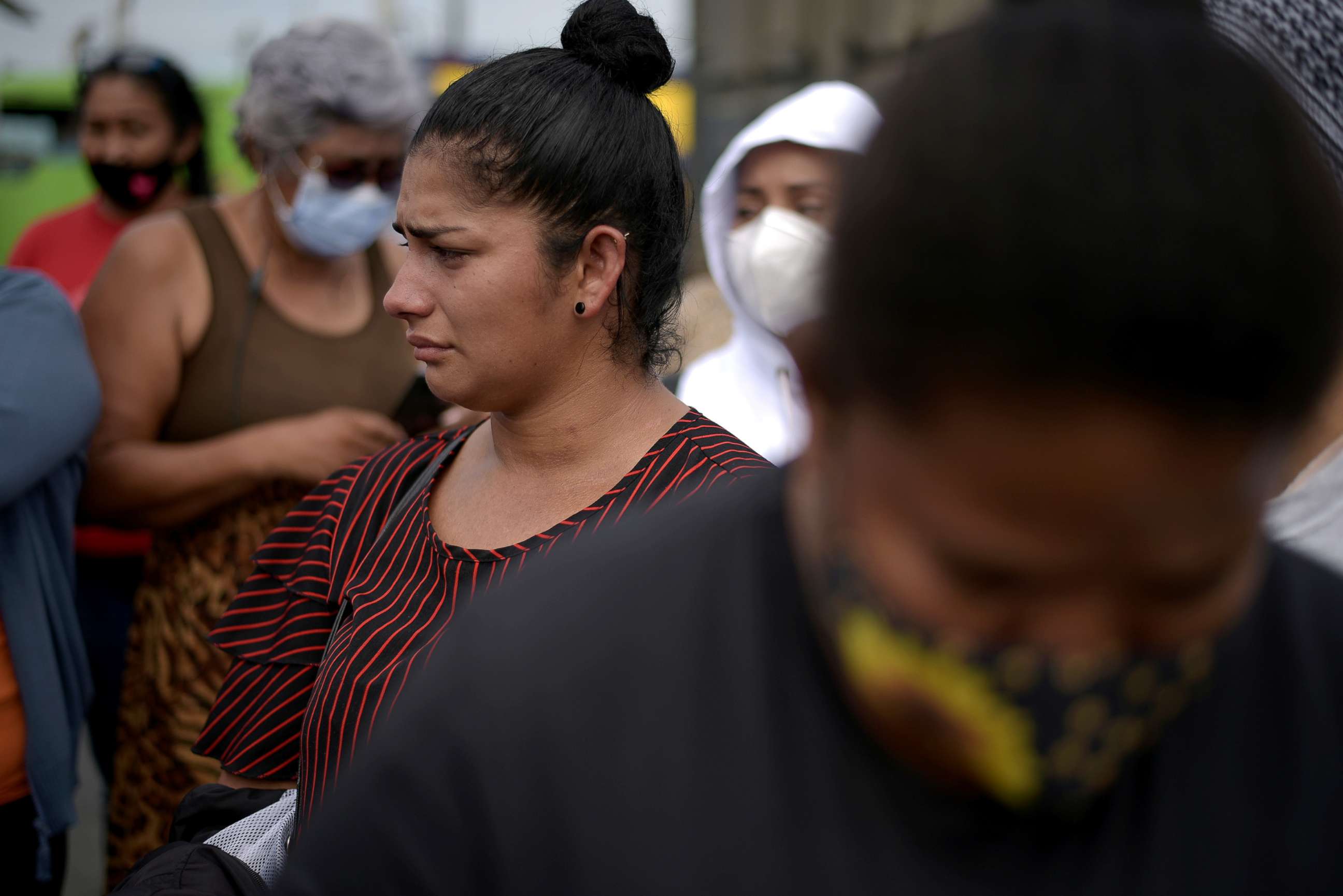 PHOTO: Family members of inmates gather outside a prison where inmates were killed during a riot that the government described as a concerted action by criminal organisations, in Guayaquil, Ecuador on Feb. 25, 2021.