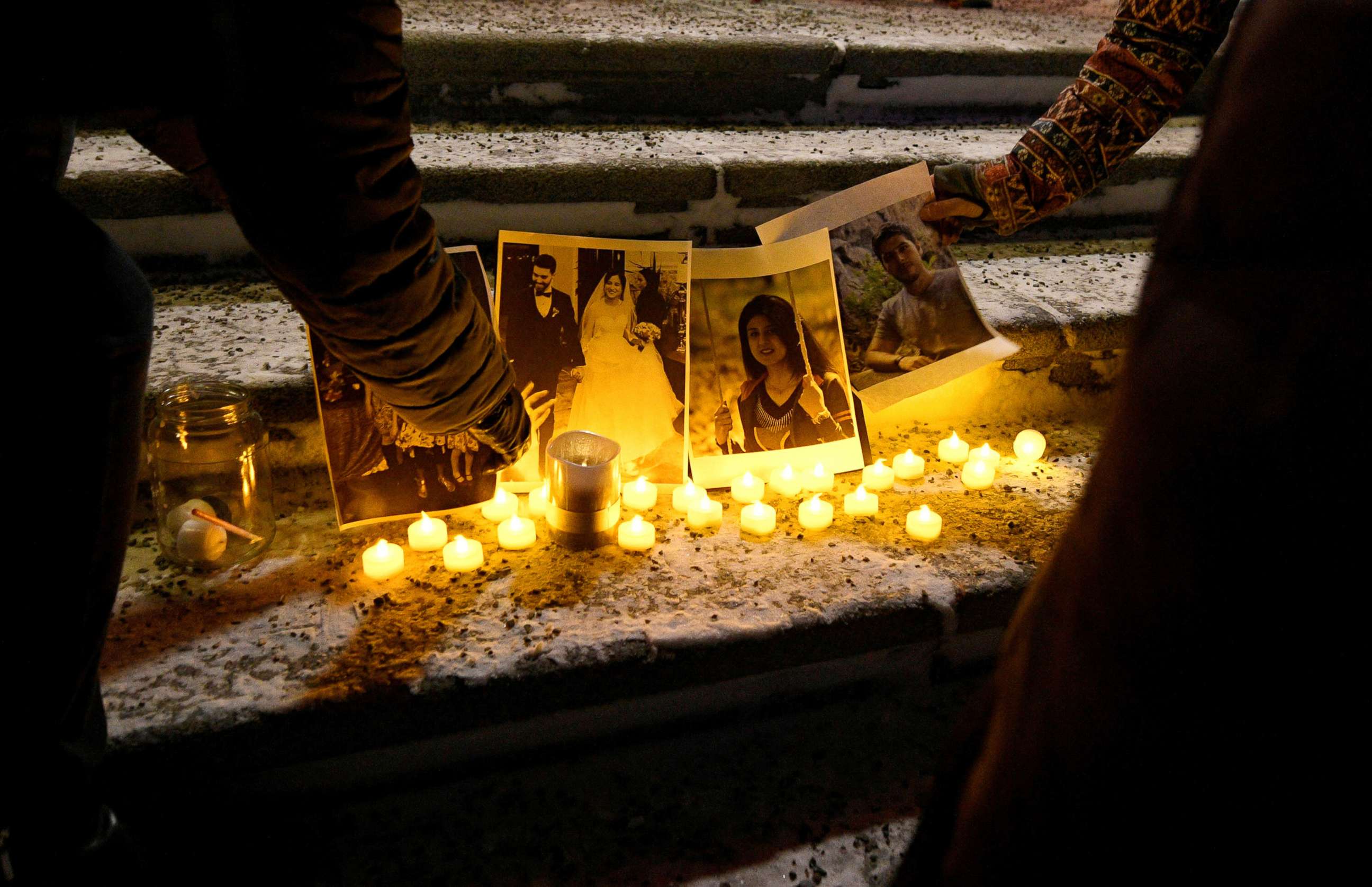 PHOTO: People attend a candlelight vigil held at the Edmonton Legislature building in memory of the victims of a Ukrainian passenger plane that crashed in Iran, in Edmonton, Alberta, Canada, June 8, 2020.