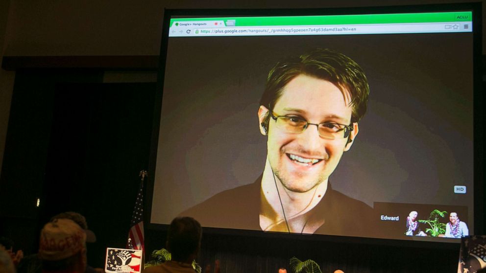 PHOTO: Edward Snowden appears on a live video feed broadcast from Moscow at an event sponsored by the ACLU Hawaii in Honolulu, Feb. 14, 2015.