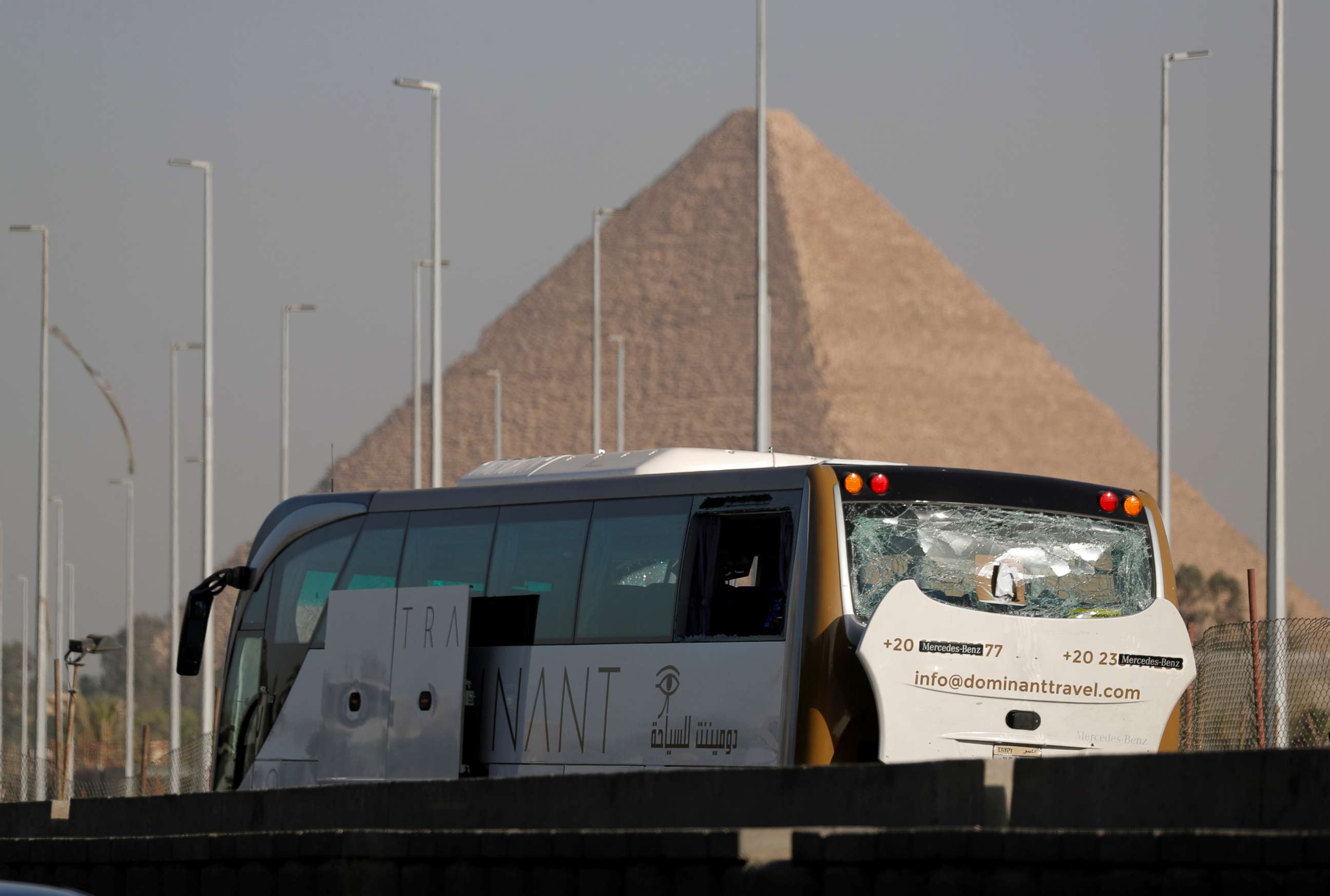 PHOTO:A damaged bus is seen at the site of a blast near a new museum being built close to the Giza pyramids in Cairo, May 19, 2019.
