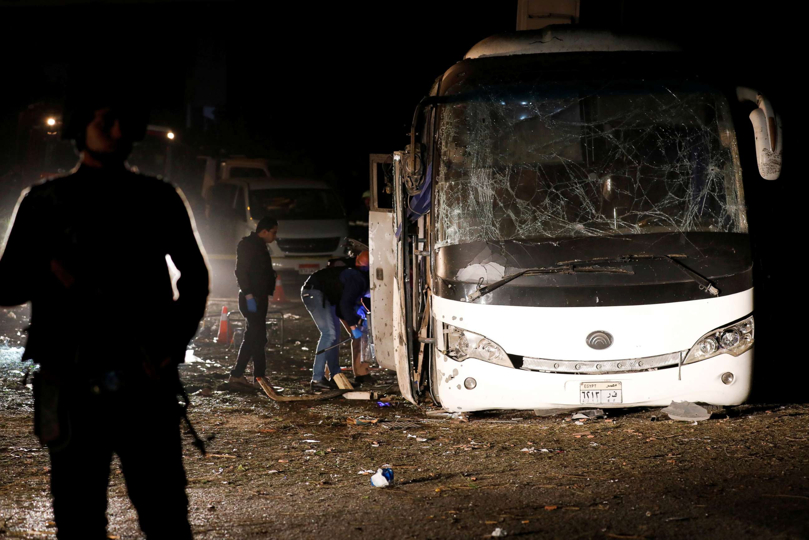 PHOTO: Police officers inspect a scene of a bus blast in Giza, Egypt, Dec. 28, 2018.