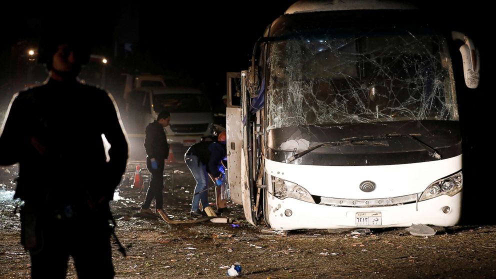 PHOTO: Police officers inspect a scene of a bus blast in Giza, Egypt, Dec. 28, 2018.