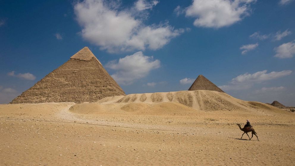 PHOTO: The Pyramid of Khafre with the Great Pyramid and Queens' Pyramid in the background .