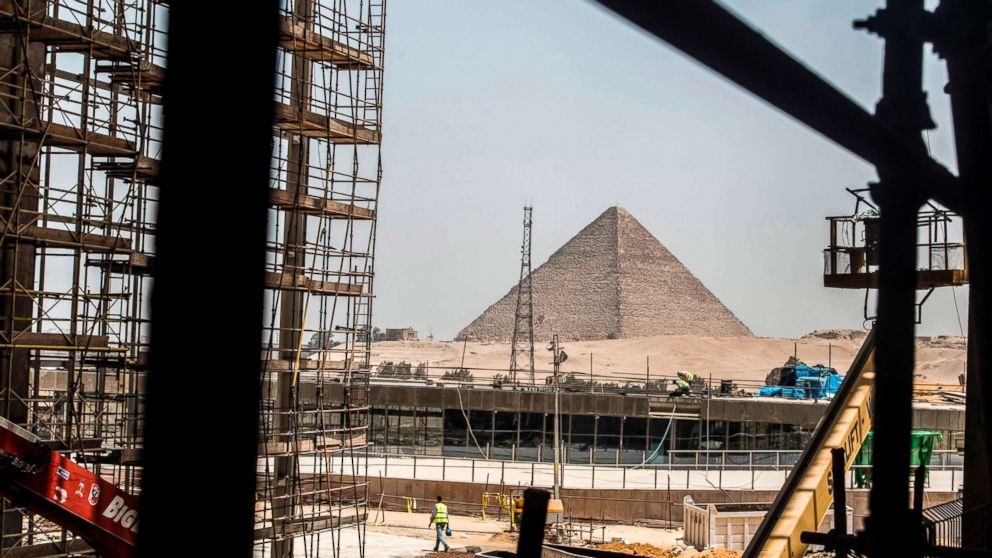 PHOTO: A picture taken on June 10, 2018 shows a view of construction work undergoing at the site of the Grand Egyptian Museum in Giza on the southwestern outskirts of the capital Cairo, with the Pyramid of Menkaure seen in the background.