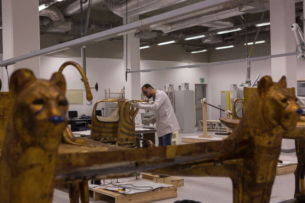  A restorer works on Old Egyptian artifacts in the Grand Egyptian Museum, April 26, 2018 in Giza Egypt.
					