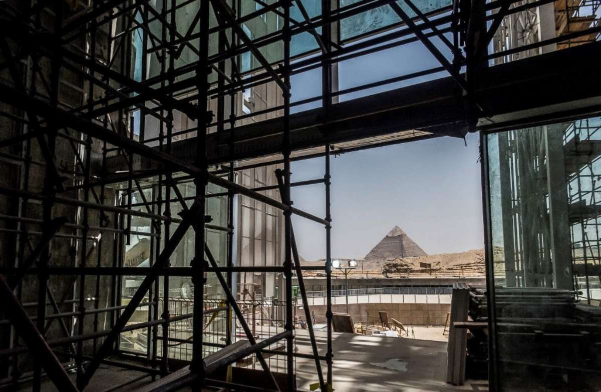 PHOTO: A view of construction work undergoing at the site of the Grand Egyptian Museum in Giza on the southwestern outskirts of the capital Cairo, with the Pyramid of Khafre, also known as Chephren, seen in the background, June 10, 2018.