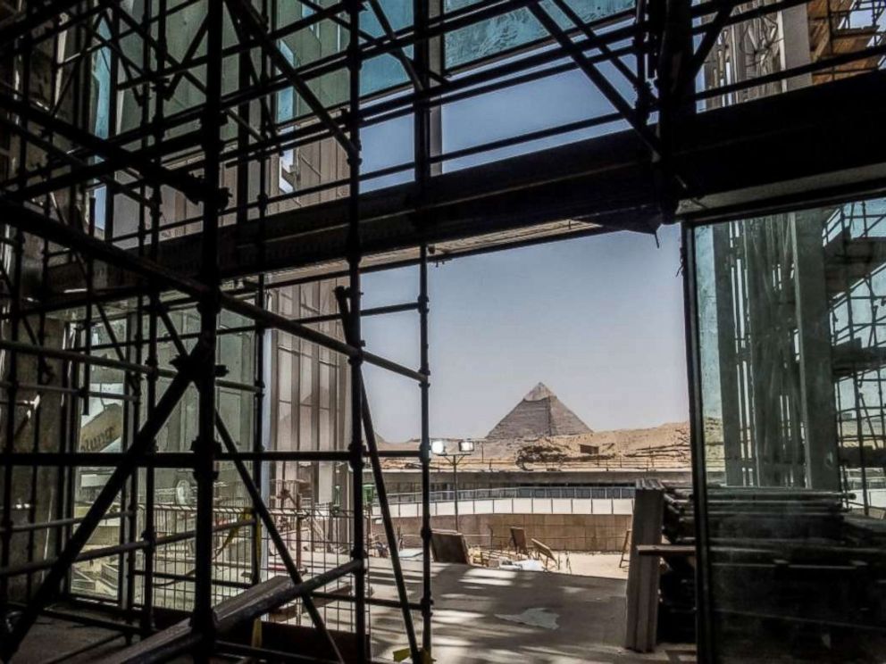 PHOTO: A view of construction work undergoing at the site of the Grand Egyptian Museum in Giza on the southwestern outskirts of the capital Cairo, with the Pyramid of Khafre, also known as Chephren, seen in the background, June 10, 2018.