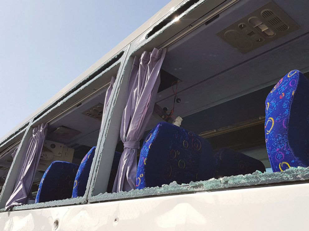 PHOTO: A damaged bus is seen at the site of a blast near a new museum being built close to the Giza pyramids in Cairo, May 19, 2019.