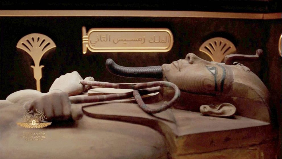PHOTO: A mummy is seen in a video screened during a ceremony of a transfer of Royal mummies from the Egyptian Museum in Tahrir to the National Museum of Egyptian Civilization in Fustat, in Cairo, Egypt April 3, 2021.