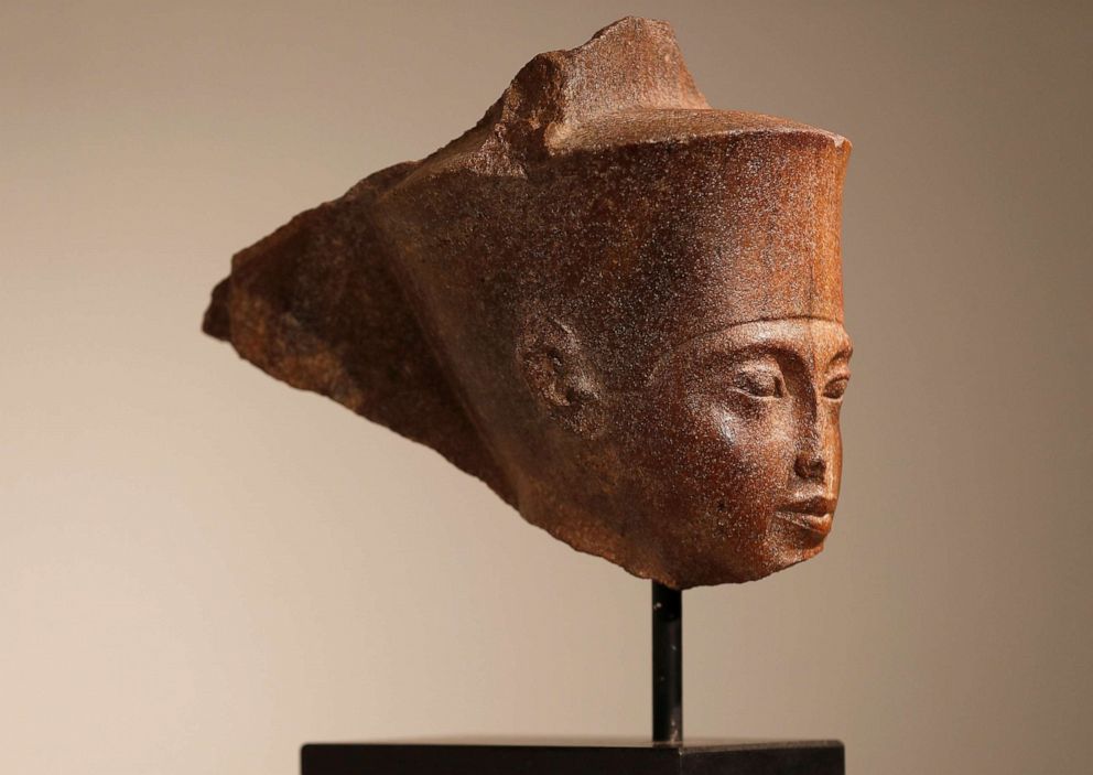 PHOTO: An Egyptian brown quartzite head of the God Amen is seen at Christie's auction house prior to its' sale in London, Britain, July 4, 2019.