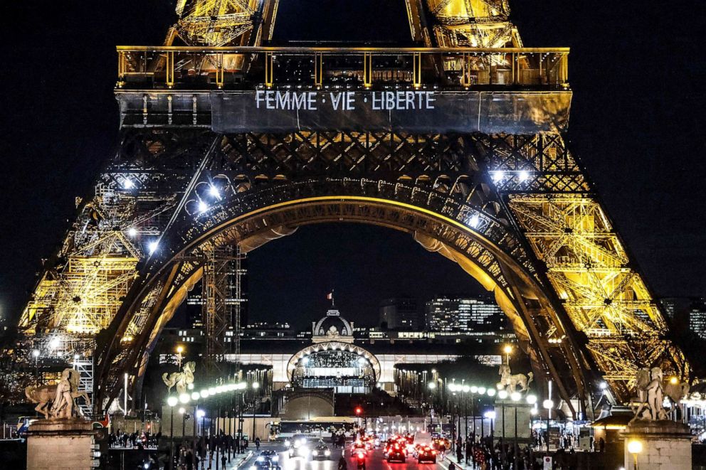 PHOTO: A photo shows the slogan "Woman. Life. Freedom." displayed on the Eiffel Tower in Paris in support of the Iranian people, in Paris, on Jan. 16, 2023.